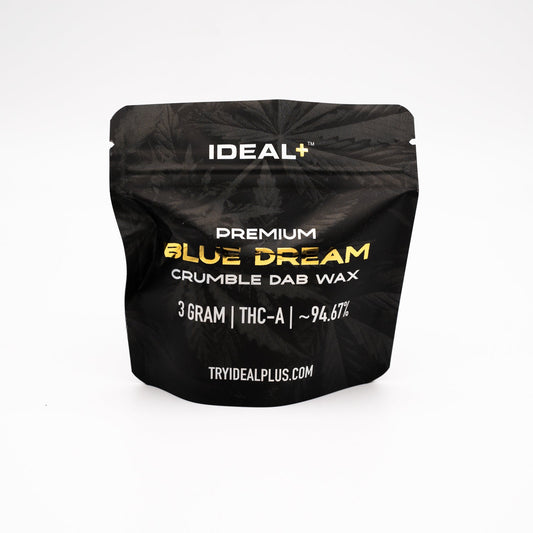 Black resealable pouch of Blue Dream 94.67% THCa Crumble Dab Wax 3g in focus