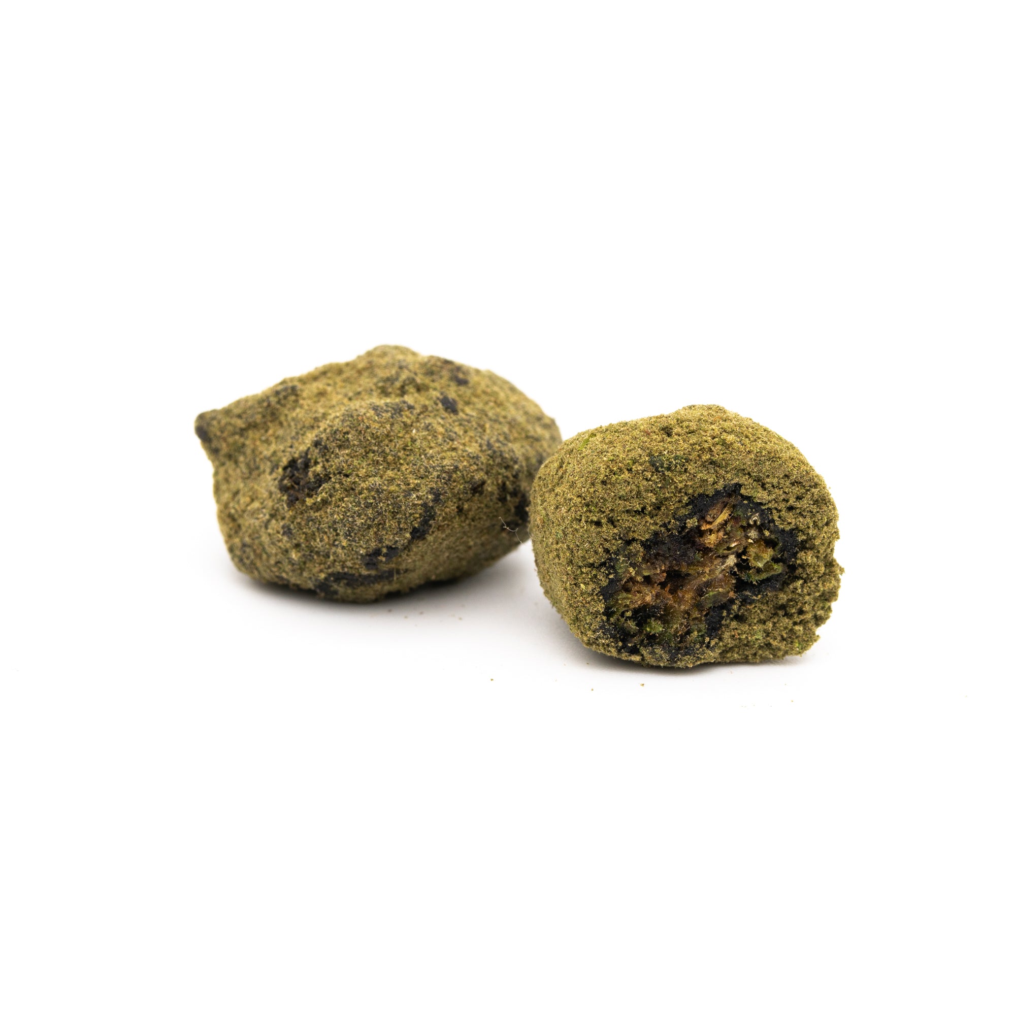 Ultra Pink Delta 8 Moon Rocks with green powder and dark specks inside