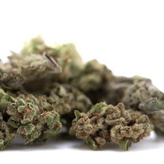 Fog Dog THCa Flower Smalls: Marijuana buds with green leaves and brown trichomes