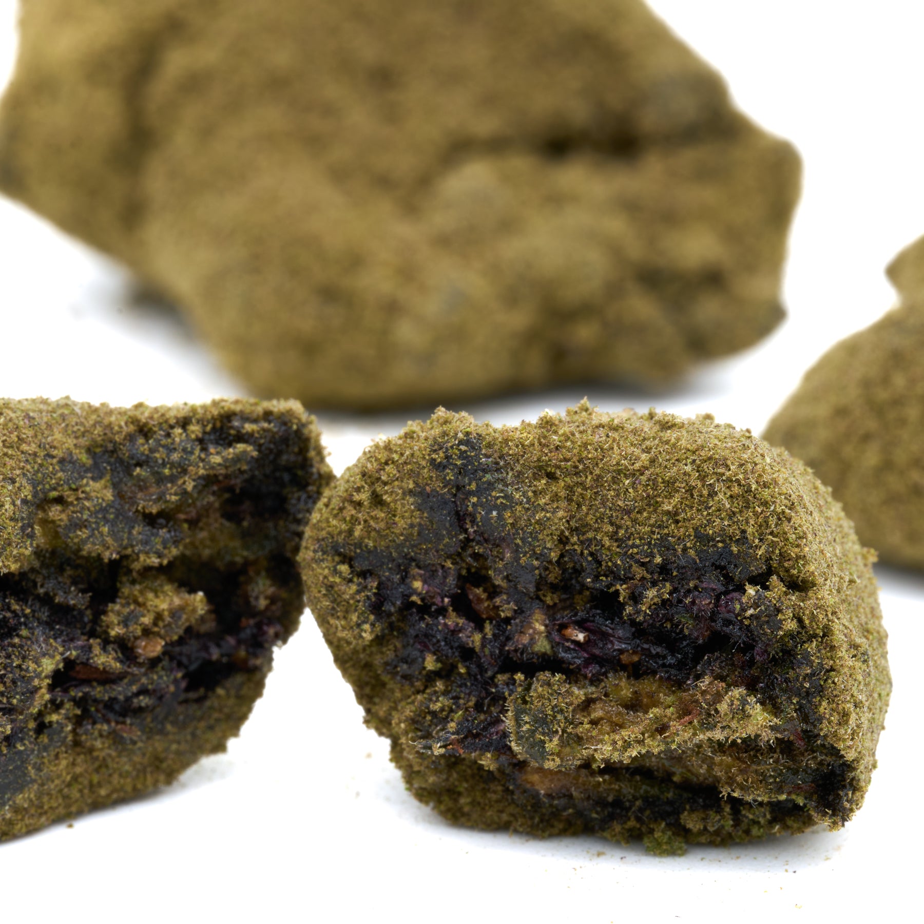 Gorilla Glue CBD Moon Rocks coated in vibrant green kief powder for enhanced potency
