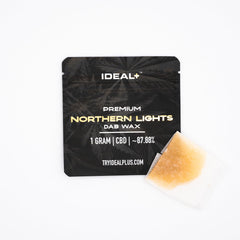 Northern Lights CBD Dab Wax packaging featuring golden extract and black design