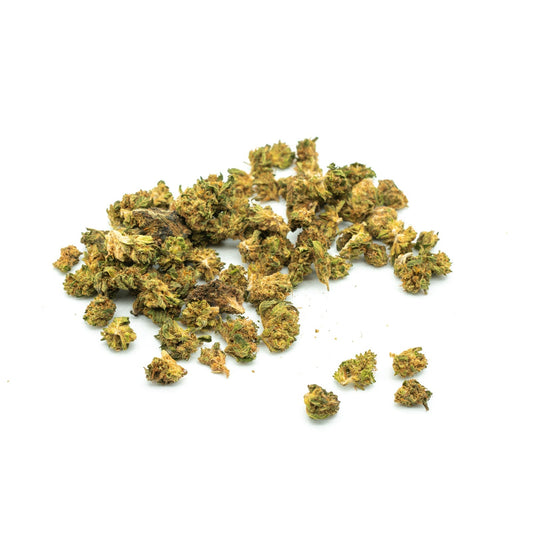 Dried Cakeberry Brulee hemp flower small nugs showcasing trichomes and vibrant green hues