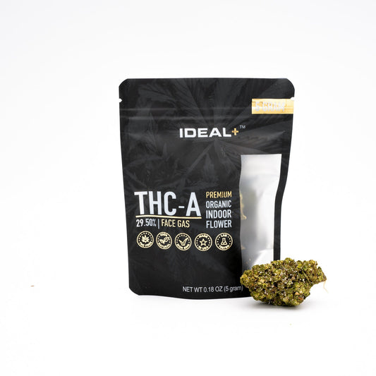 Black resealable package of Face Gas THCA Flower with a small cannabis bud displayed