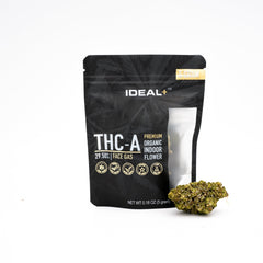 Black resealable package of Face Gas THCA Flower with a small cannabis bud displayed