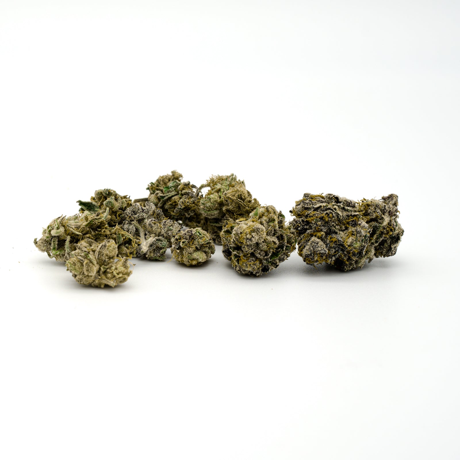 Dried Obama Kush THCA flower buds with dense olive-green coloring for cerebral stimulation