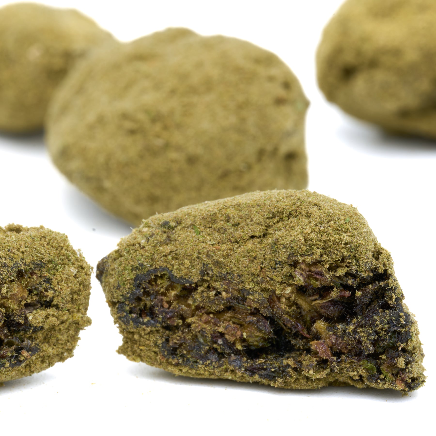 Bubba Kush CBD Moon Rocks featuring cannabis-infused cookies with a green coating